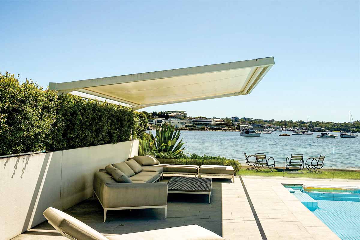 cantilevered retracting awnings
