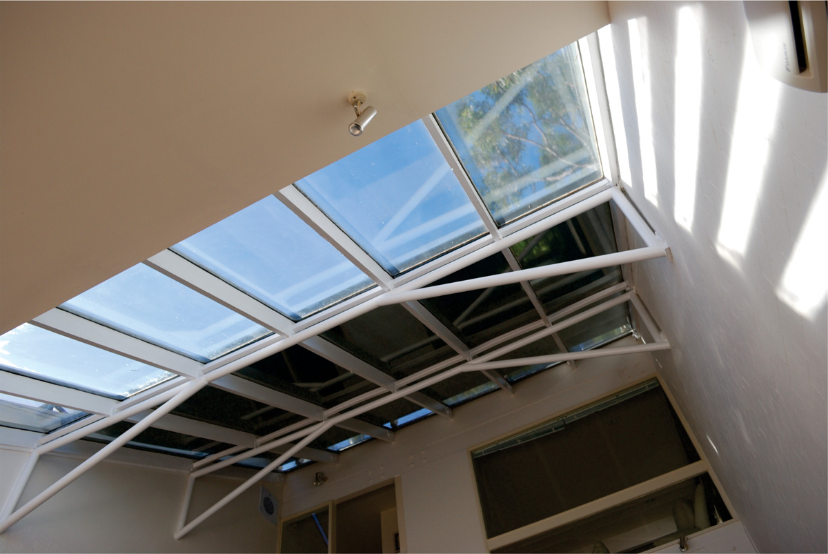 retracting awnings for glass roof