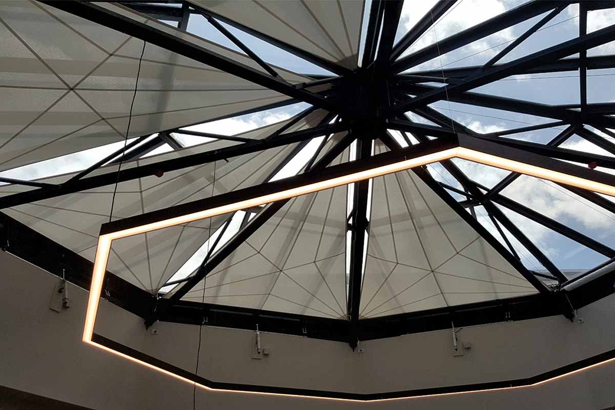 retracting awnings for glass roof