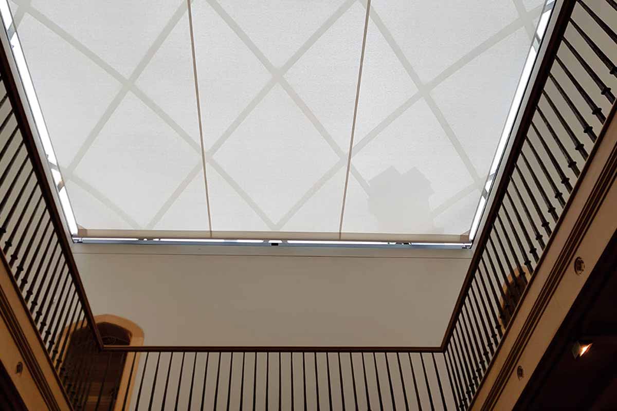 retracting awnings for glass roof