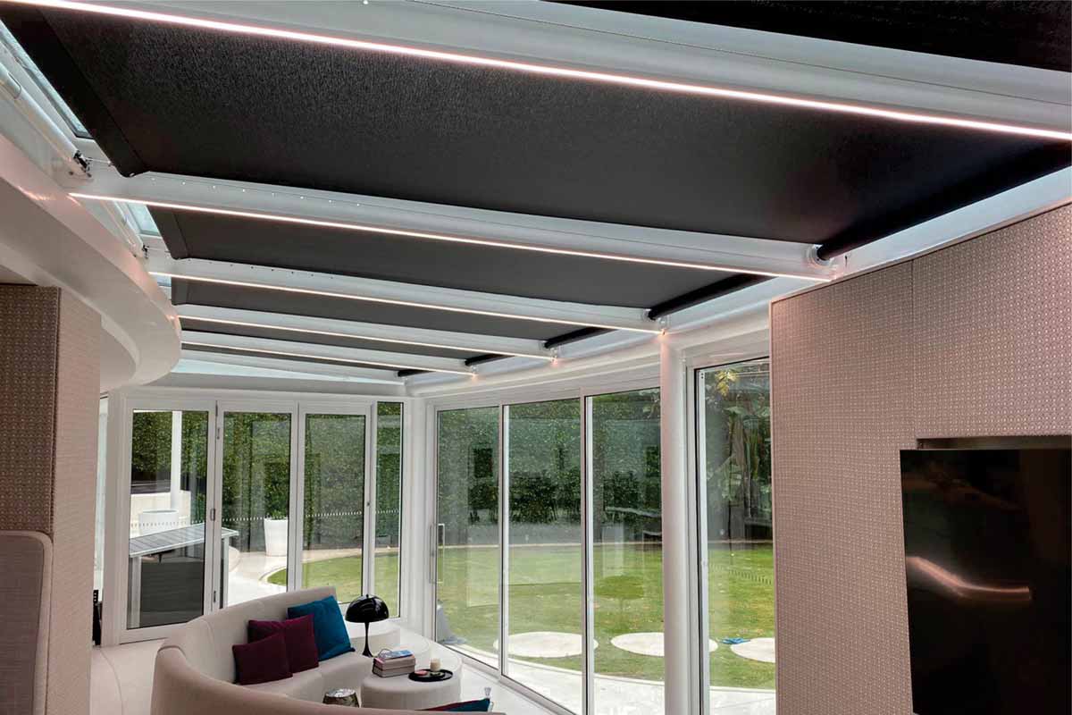retracting awnings for glass roof