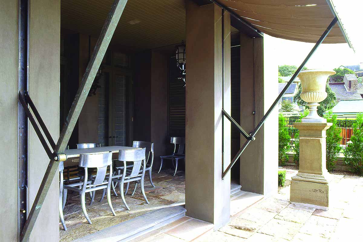 retracting awnings with arms