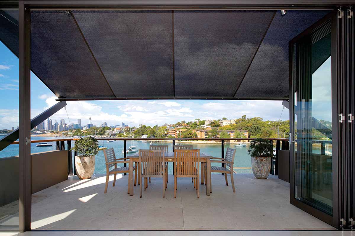 retracting awnings with arms