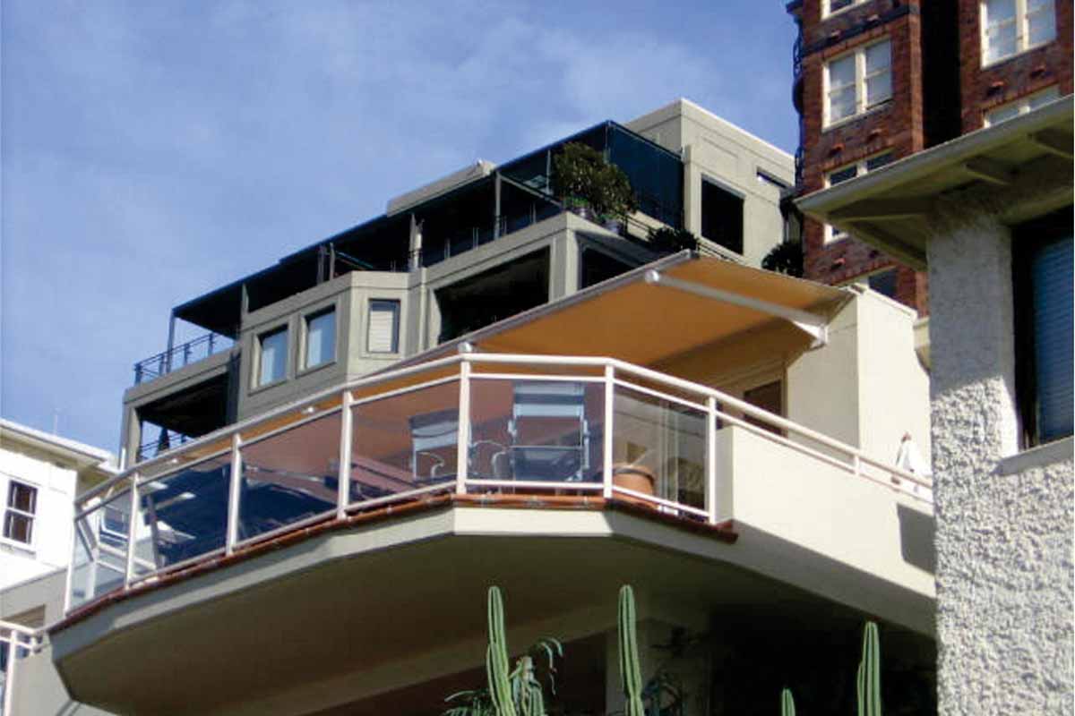wall mounted cantilevered awnings