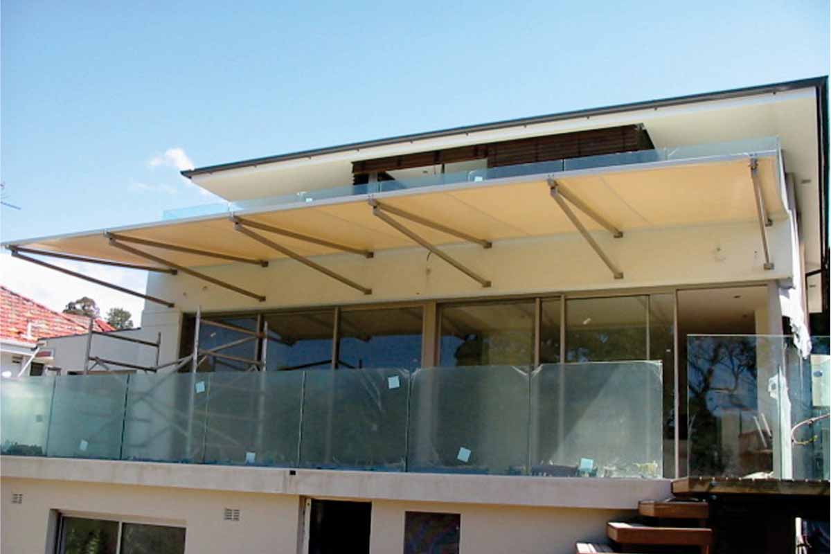 wall mounted cantilevered awnings