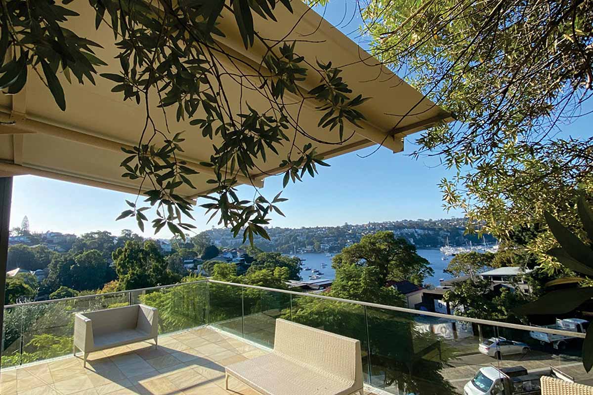 wall mounted cantilevered awnings